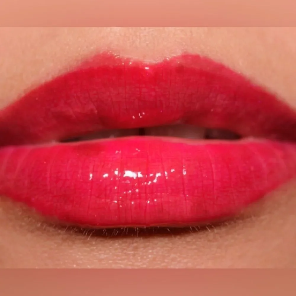 NIB MAC Archie’s Girls Lipglass in “Strawberry Malt”